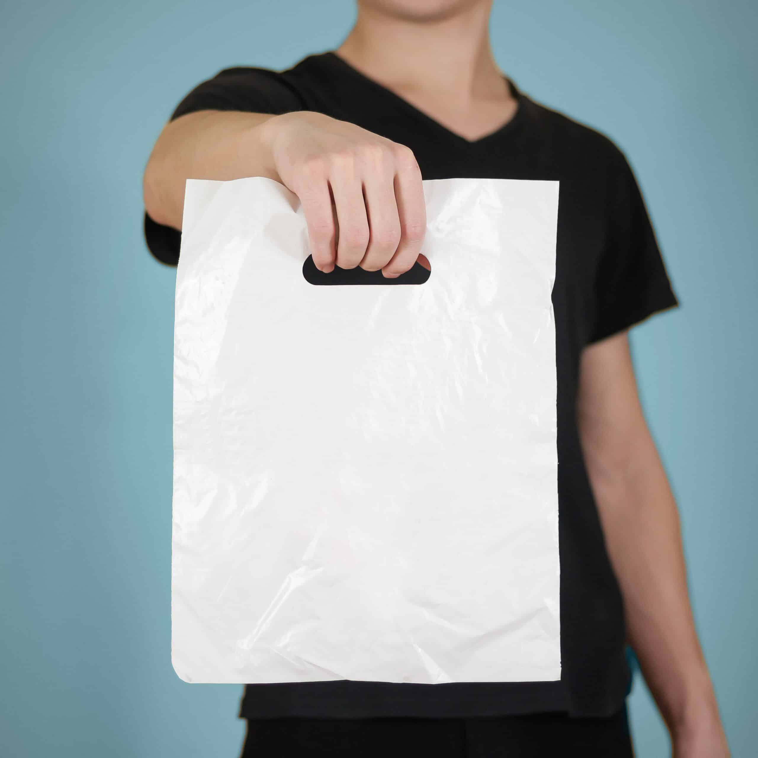 Man,Shows,White,Blank,Plastic,Bag,Mock,Up,Isolated.,Empty